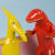 Lorien Stern sculptures of dinosaurs in bright yellow and red