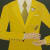Painting of the torso of a man in a yellow suit holding a martini glass with several olives in it
