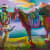 Colorful painting by John Holcomb of man standing next to his horse, available at the Rebecca Hossack Art Gallery