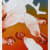 A collage of various nude figures with distorted faces against a multicoloured gradient background by artist Sidney Nolan.