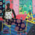 A painting of a West-African woman in a floral dress and a bird on her knee sitting at a table by Dutch artist Carla Kranendonk.