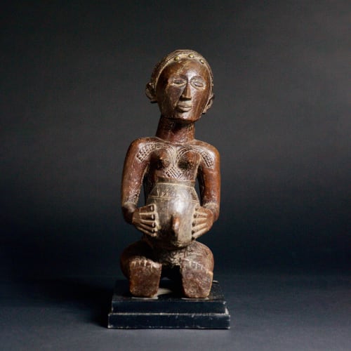 Luba Figure of a Woman, 19th - 20th century  Wood  height 37 cm  height 14 5/8 in