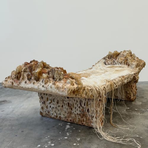 Anna Kunst  The Primal Awe bench, 2024  Raw Honey Calcite Crystals, Hand Colored Sand Binder, Handwoven Deadstock Linen Yarns and Filament Yarns  46 x 143 x 54 cm  18 x 56 ¼ x 21 ¼ in  Unique