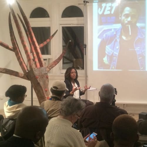 Tiana Webb Evans, Moderating Artist Talk with Adger Cowans, Fab 5 Freddy, Melvin Van Peebles and Dr. George Nelson Preston at Merton Simpson Gallery, (New York, NY), 2015.