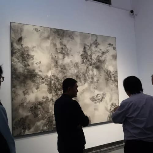 Artist Tai Xiangzhou and his work “Celestial – Placeless and Timeless”. Photo Credit: TANC