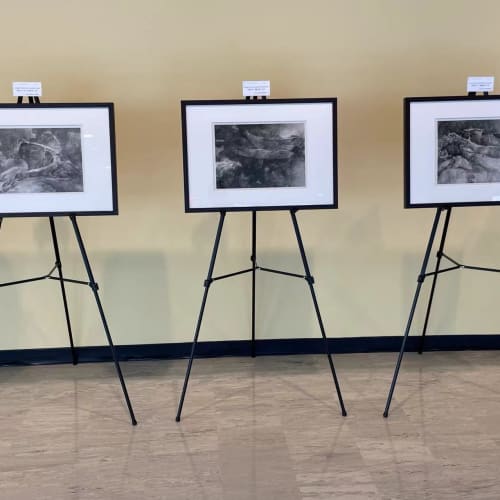 three paintings by Tai Xiangzhou, exhibiting on tripod stands