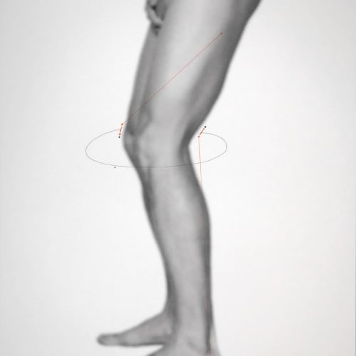 A side view of a leg, then a nude, slightly bent out of focus photo