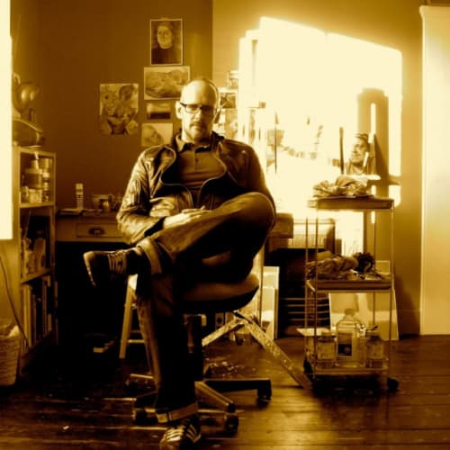 Photo of Andrew James in his studio