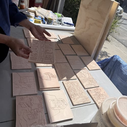 Raina Lee in her studio with works in progress