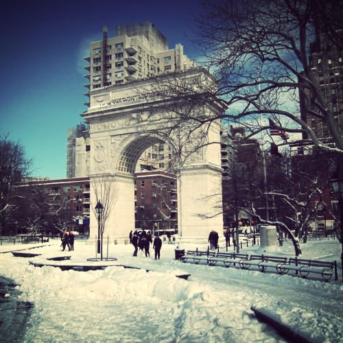 Snow in Washington Square Park, NYC. by ariel jatib is licensed under CC BY-SA 2.0.