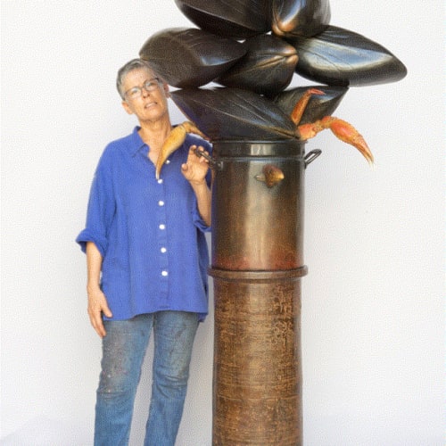 Leslie Ortiz alongside Seafood Feast ll, 2019 Painted bronze 80 x 33 x 18 inches Available at Surovek Gallery