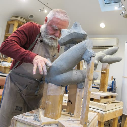 Sculptor Emilio DiIorio working in his studios