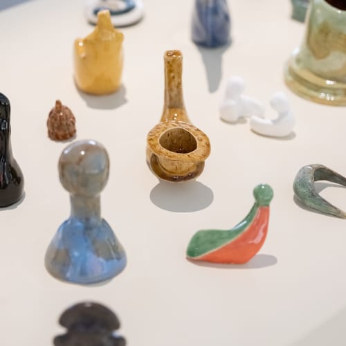 Rand Abdul Jabbar, Earthly Wonders, Celestial Beings, 2019-ongoing Glazed stoneware, dimensions variable (Installation view, Louvre Abu Dhabi, 2022). Courtesy of the Artist.
