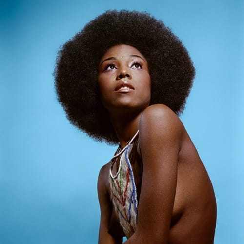 Kwame Brathwaite, Untitled (Model who embraced natural hairstyles at AJASS photoshoot) (1970). Archival pigment print.