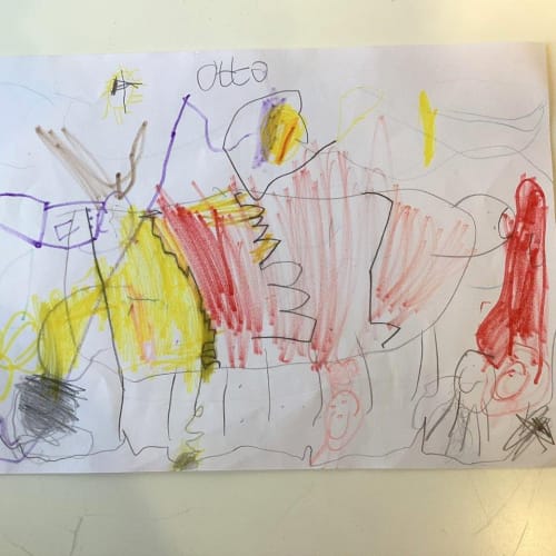 A child's drawing of a dog with many expressive lines and shapes