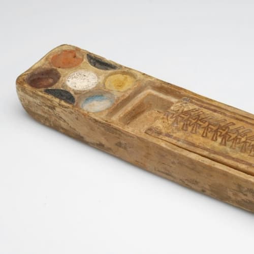 An Egyptian ceramic cox of pigment paint cakes, 2 5/16 x 8 11/16 x 2 3/16 inches, 1302-1070 BCE Collection of the Rhode Island School of Design