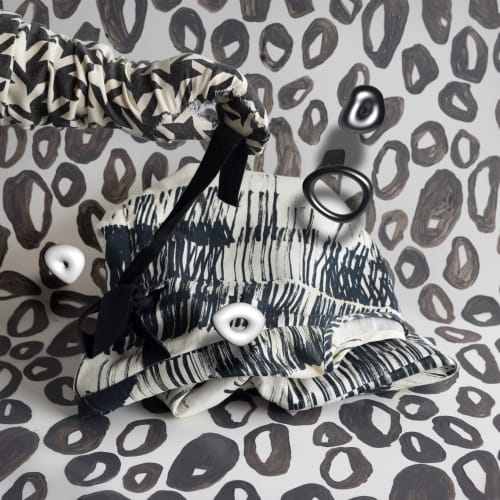 Michelle Forsyth Black and white glove with floating rings, 2022 archival inkjet print 36 x 36 in. 91.4 x 91.4 cm Edition of 5