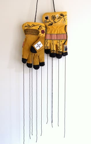 Audie Murray Rooting Gloves, 2019 Commercial leather, cotton, beads, acrylic 50 x 12 inches 127 x 30.5 cm