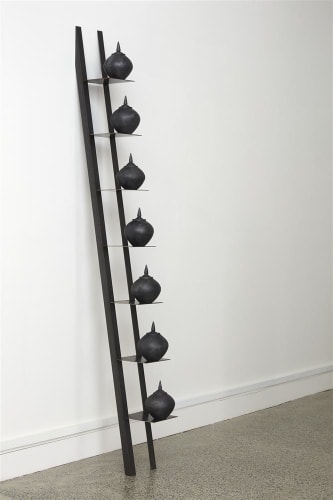 Julie Cromwell Centred Rhythm, 2020 7x carbonised raku vessels, steel, installation view 2400 x 560 x 200 mm