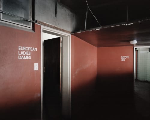 Patrick Waterhouse Patrick Waterhouse & Mikhael Subotzky: Apartheid-era bathroom signs, Ponte City, 2008 Inkjet print 105 x 131 cm / 125.5 x 150 cm Edition of 5 Series: Ponte City