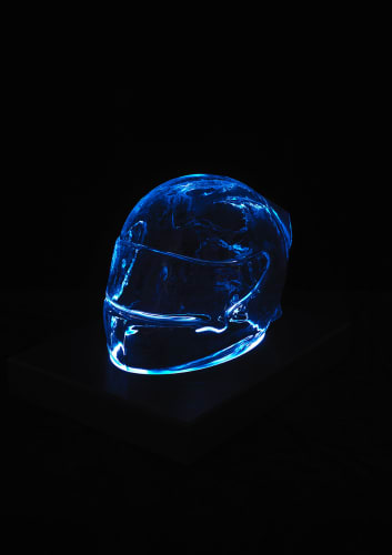 F1 Helmet  Angela Palmer  Cast in crystal glass from helmet worn by current F1 driver  Blown by master glassblowers, Birmingham UK  25 x 24 x 34 cm  Edition of 6