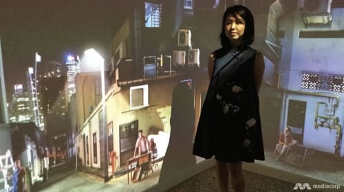 Artist Sarah Choo Jing standing in front of her immersive video installation Art of the Rehearsal at the 2017 Venice Biennale. (Photo: Genevieve Loh)
