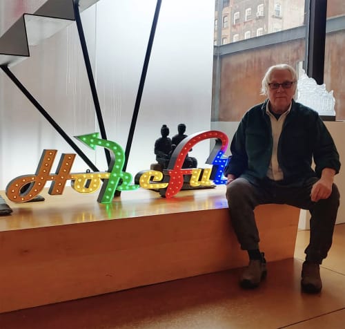 Charlie Hewitt with his Hopeful sign