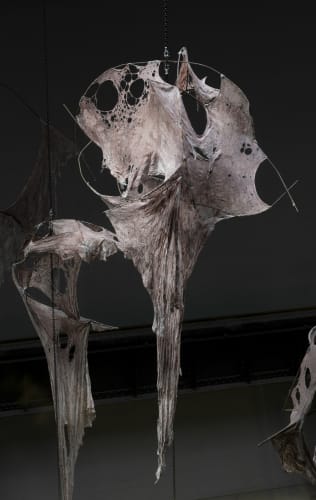 Mire Lee transforms Tate Modern's turbine hall into eerie factory of skin-like sculptures