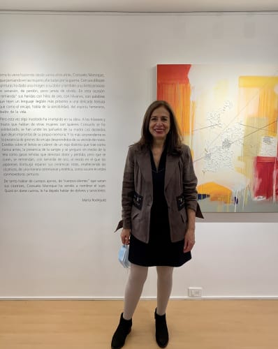 Consuelo Manrique in front of her work "Corporal Geography."