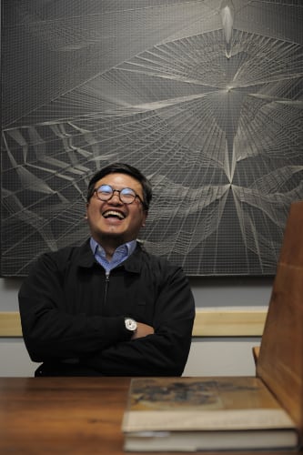 Portrait of artist Chen Duxi laughing