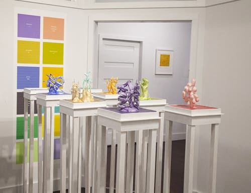 Installation shot: “From Energy, Matter Emerges 9.2.2020,” 84”w x 36”d x 57”h, and “The New Periodic Table 9.5.2020,” digital print on archival paper, 71.25” x 24."