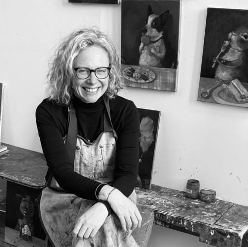 photograph of artist Alison Friend seated in studio