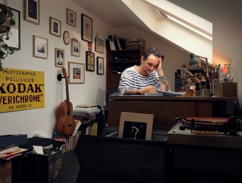 Photograph of artist working in a studio