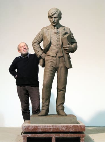 Philip Jackson alongside one of his commissions