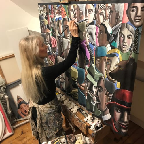PJ Crook painting in her studio