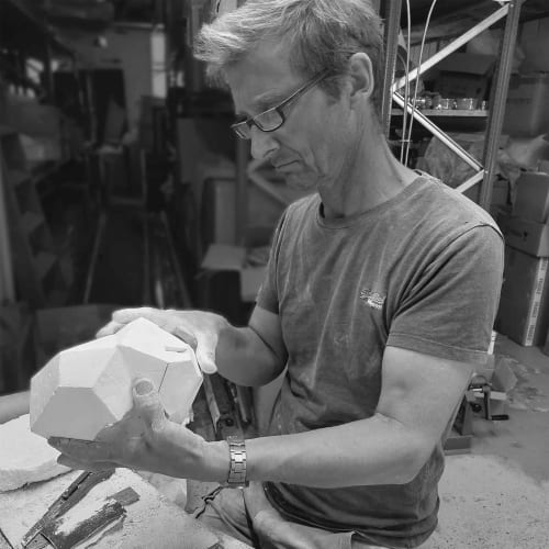 Martin making scuptural plaster light
