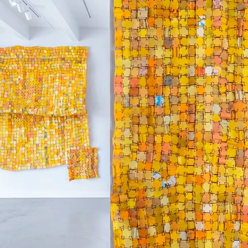 Installation shot from Ghanaian artist Serge Attukwei Clottey's solo exhibition titled Erased Past shown at Brigade Gallery in Copenhagen, Denmark