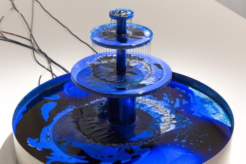 Caline Aoun, Reading The Flows Over Durations, 2022 Plexiglas, Stainless steel, pump, water-based inkjet ink, pipe. Ø 80 cm Diameter (base)