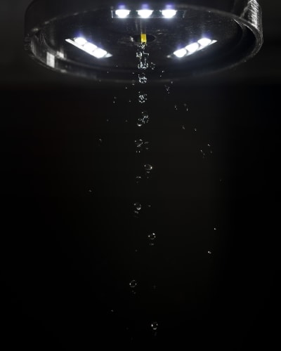 Haseeb Ahmed, A Fountain of Eternal Youth, 2022, Human growth hormone (Sytropin and Genf20), ginkgo biloba, water, aluminum, ox gall, 3D prints, electronics, custom software, sound composition, and polycarbonate, 240 x 250 x 82 cm, 94 1/2 x 98 3/8 x 32 1/4 in