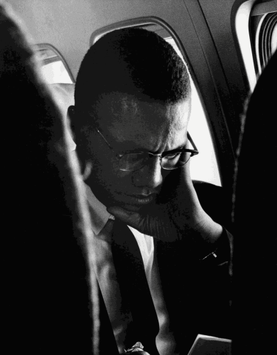 Gordon Parks, “Untitled, Phoenix, Arizona, 1963.” The photo shows Malcolm X reading. The photograph is included in the recently released expanded version of “Gordon Parks: Born Black: A Personal Report on the Decade of Black Revolt 1960-1970.”Credit: The Gordon Parks Foundation