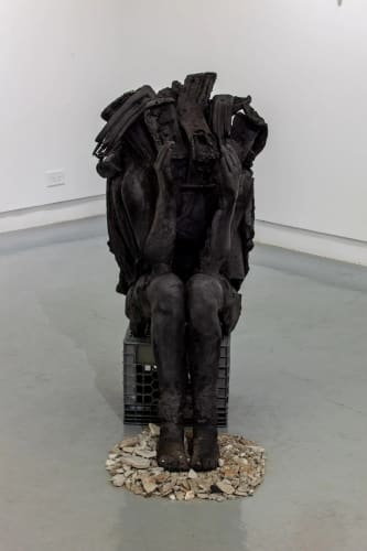 Chiffon Thomas, A subaltern’s attempt to speak, 2021. Foam, rigid plastic urethane, concrete, paint, charcoal, saw dust, milk crate. 45 x 23 x 33 in.