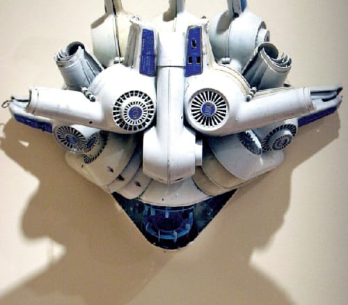 Artist Willie Cole created “Wind Mask East” from hair dryers in 1990. Photo by Marjan Sadoughi/Palo Alto Online.