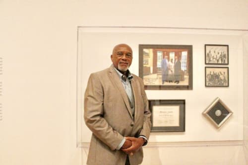 Olympian Tommie Smith at the “With Drawn Arms” exhibit at the High Museum of Art in Atlanta (Photo credit: Cassidy S)