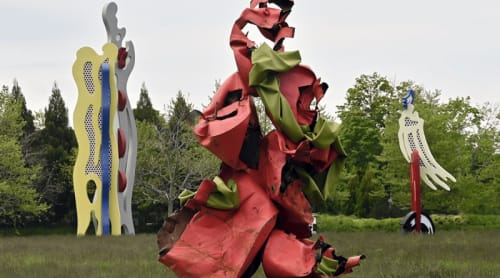 An installation by Kennedy Yanko outside the Parrish Art Museum, with Roy Lichtenstein’s long-term installation, Tokyo Brushstrokes I & II in the background.