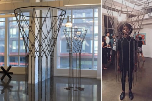 "I Am Michael Jordan" and "I Am Scottie Pippen" — basketball rims with dangling nets made from metal and reappropriated rusted chain — recently debuted as part of Esmaa Mohamoud's "The Condition of The Black Man" series.