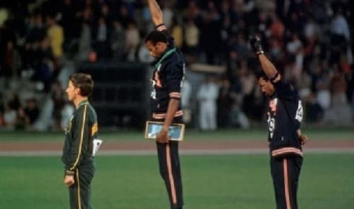 JOHN LEGEND & JESSE WILLIAMS TO EP 1968 OLYMPICS PROTEST SALUTE DOCUMENTARY