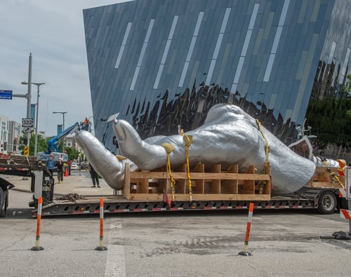 Tony Tasset's Giant hand sculpture arrives in Cleveland. Photo: Robert Mueller