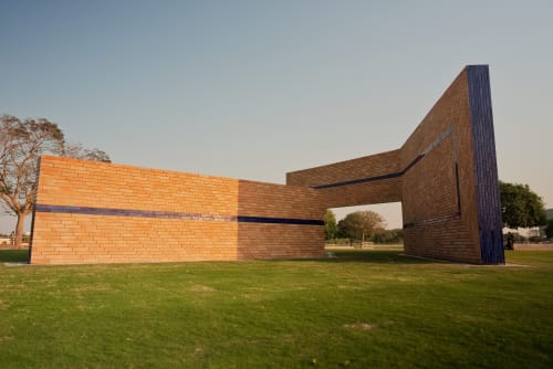 Mehdi Moutashar, Aspire House, 2024, Clay Brick and Blue Ceramic Glaze, 4.5 x 21.4x 14.8 m. Image courtesy of Qatar Museums.