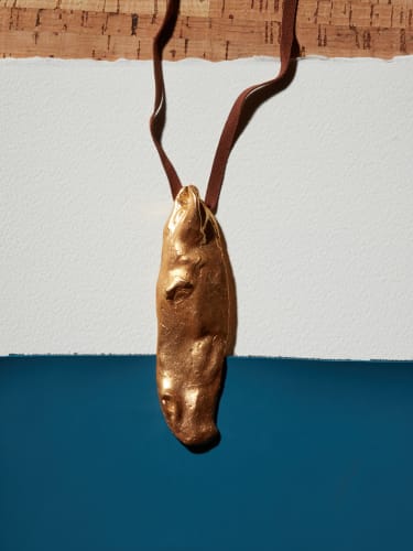 Nic Fiddian Green, 'Horse at Water' Pendant, 2015, vermeil with half loop on reverse and patinated bronze stand. Incised with artist’s signature, numbered & hallmarked. Pendant: 11.5 x 3.2 x 1.7 cm. Edition of 3 in collaboration with Louisa Guinness.