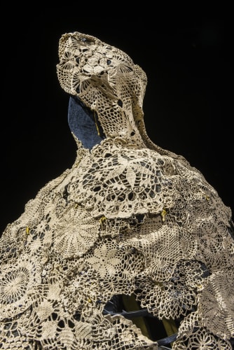 This 19th century crinoline made of steel and draped with lace that’s been dipped in soil from Agnes Joaquim’s garden was inspired by the woman herself, who created Singapore’s national flower, Vanda Miss Joaquim.